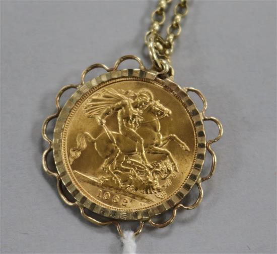 An Elizabeth II 1962 gold sovereign in pendant mount on 9ct gold suspension chain